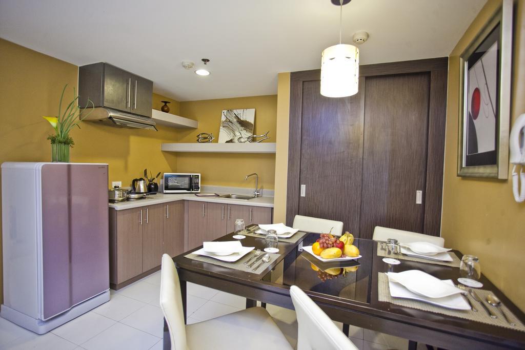 The Exchange Regency Residence Hotel Managed By Hii Pasig City Quarto foto