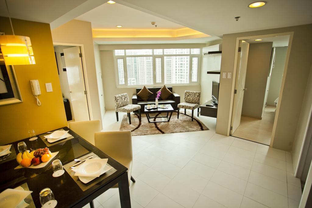 The Exchange Regency Residence Hotel Managed By Hii Pasig City Quarto foto