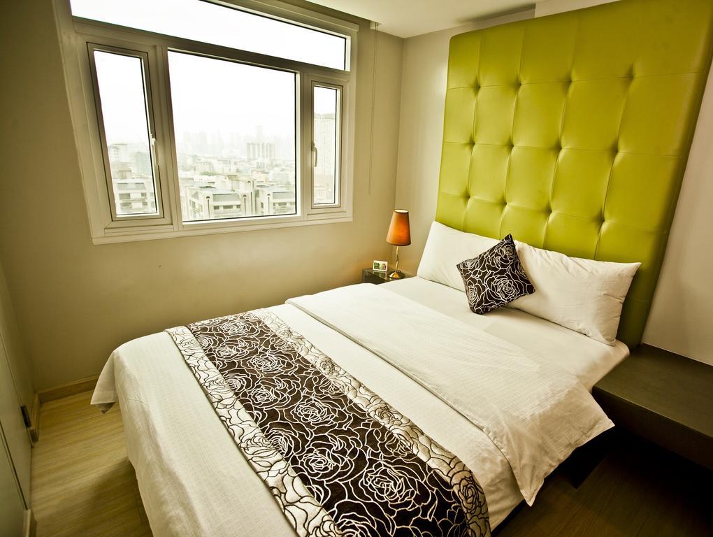 The Exchange Regency Residence Hotel Managed By Hii Pasig City Quarto foto