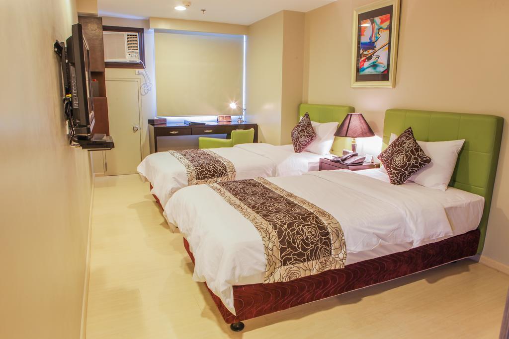 The Exchange Regency Residence Hotel Managed By Hii Pasig City Exterior foto